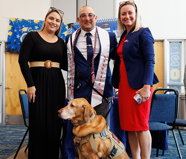 Fall 2025 MVSS Graduation Veterans with service dog and supporters