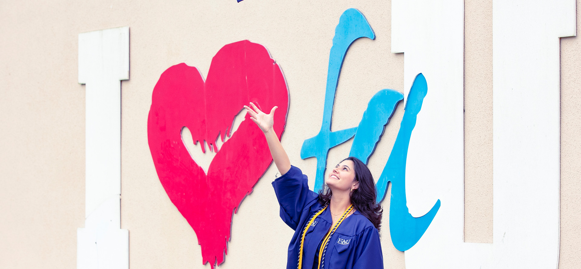 Access Program Banner with student throwing graduation cap in the air