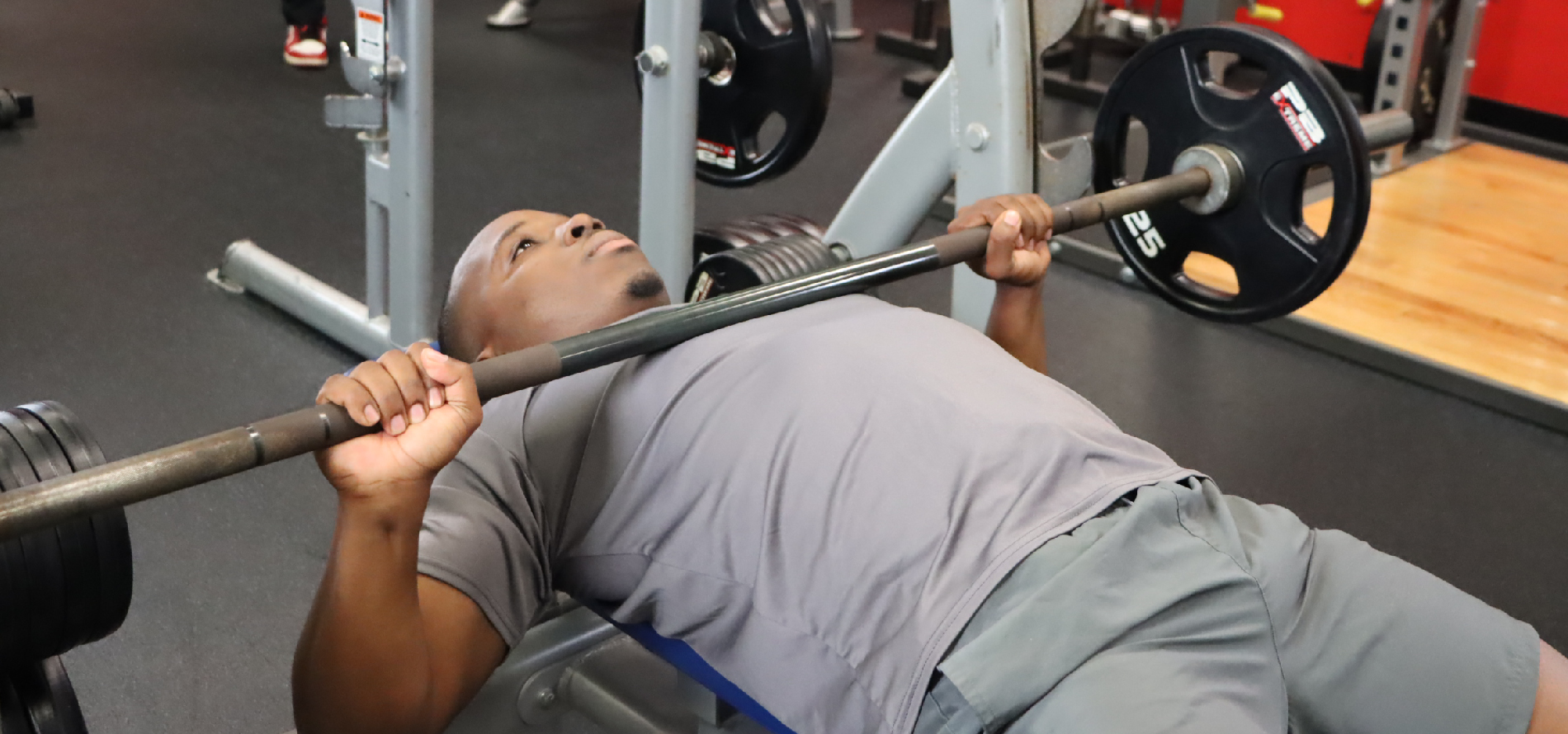 Broward student working out on the bench press