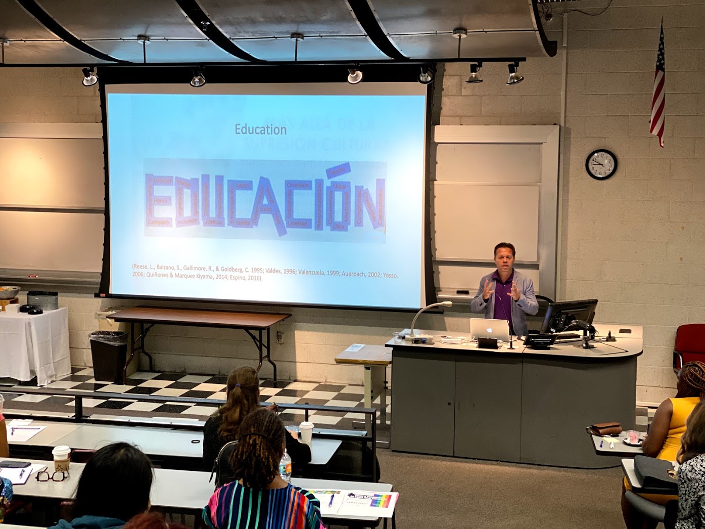 Andrés Ramírez, Co-Chair of FAU’s Hispanic Serving Institute Research Interest Group welcomes the audience with an overview of the concept of “Educación” – a Latin-centered view of Education.