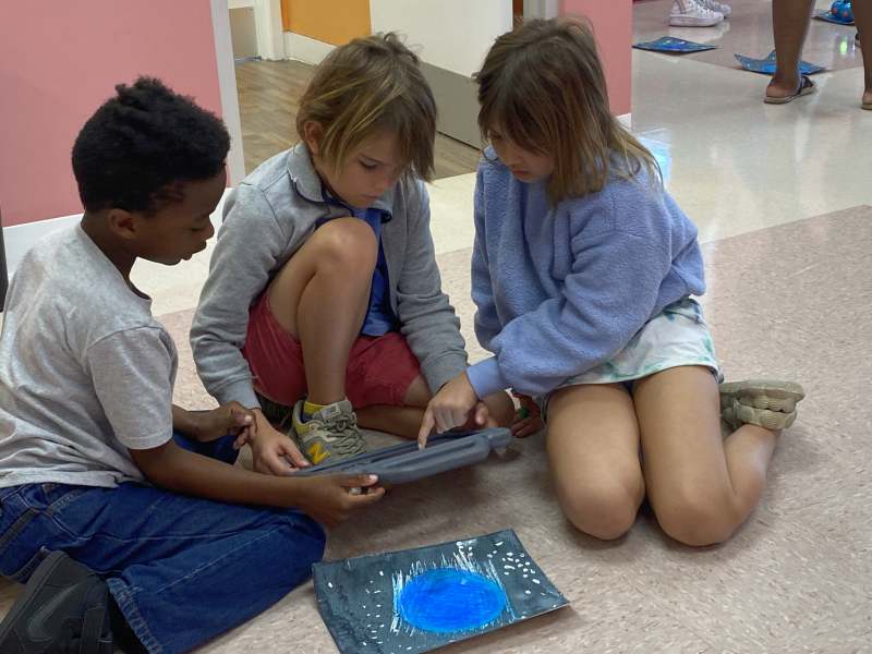 Children viewing a tablet