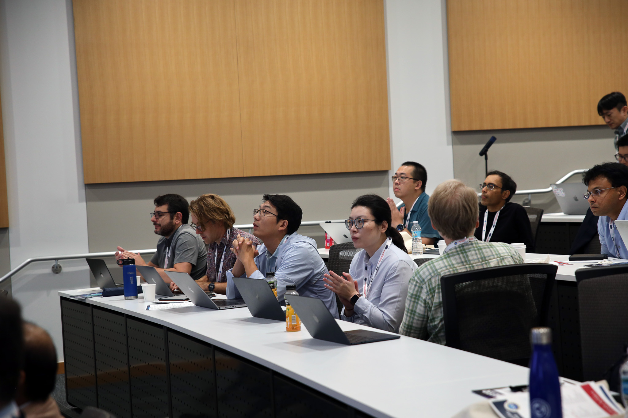 Group of people watching a presentation