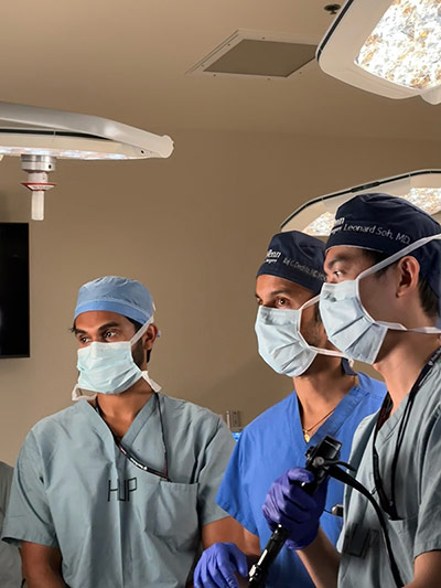 Akshay Tangutur in operating room observing operation