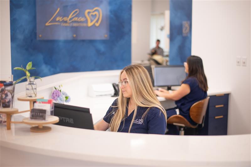 Staff at Dr. Lovelace's Dentistry Office reception desk