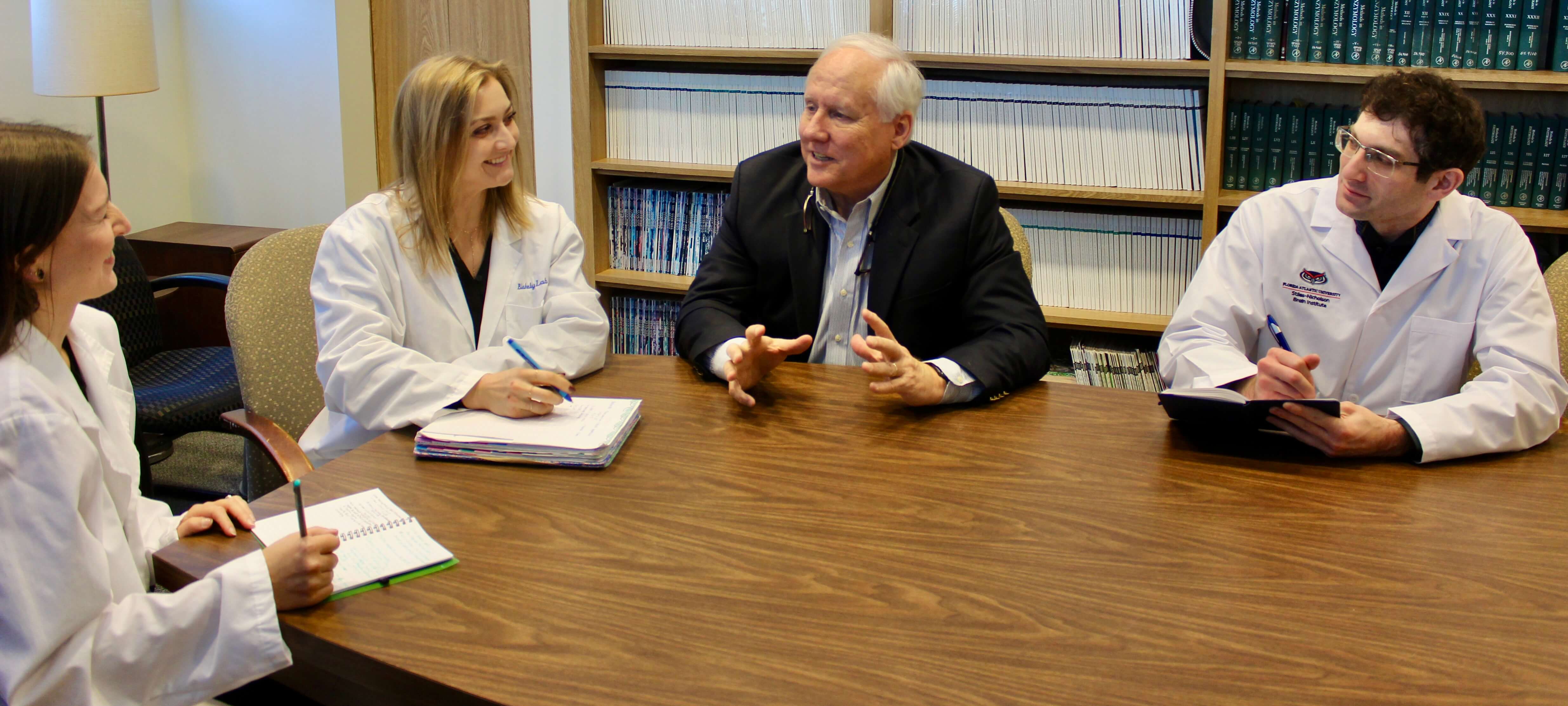 (From left): Paula Gajewski-Kurdziel, Ph.D.; Carina Meinke; Randy D. Blakely, Ph.D.; and Matthew Schrier, Ph.D.