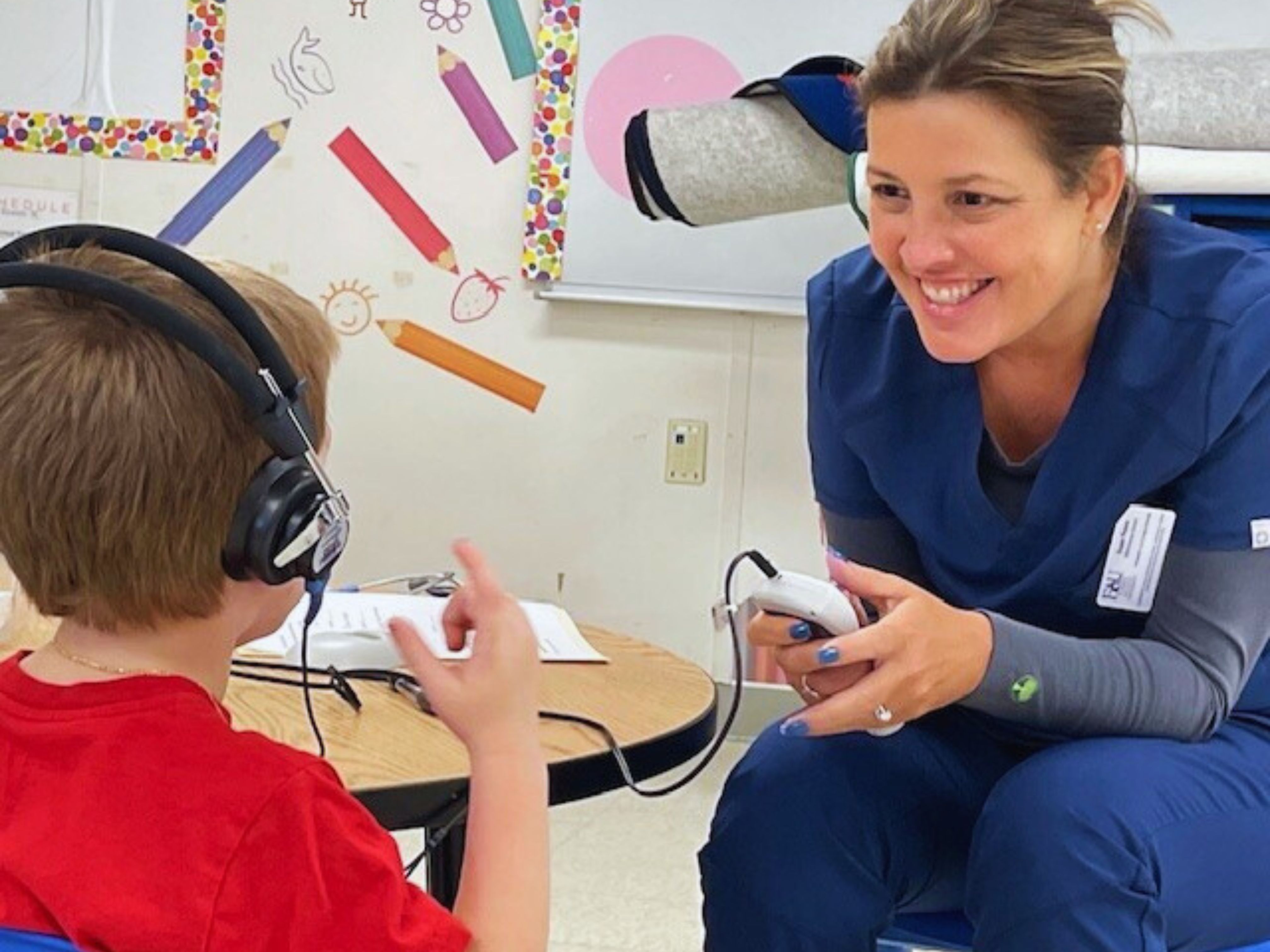 Images of nurses doing physicals for the Head start program