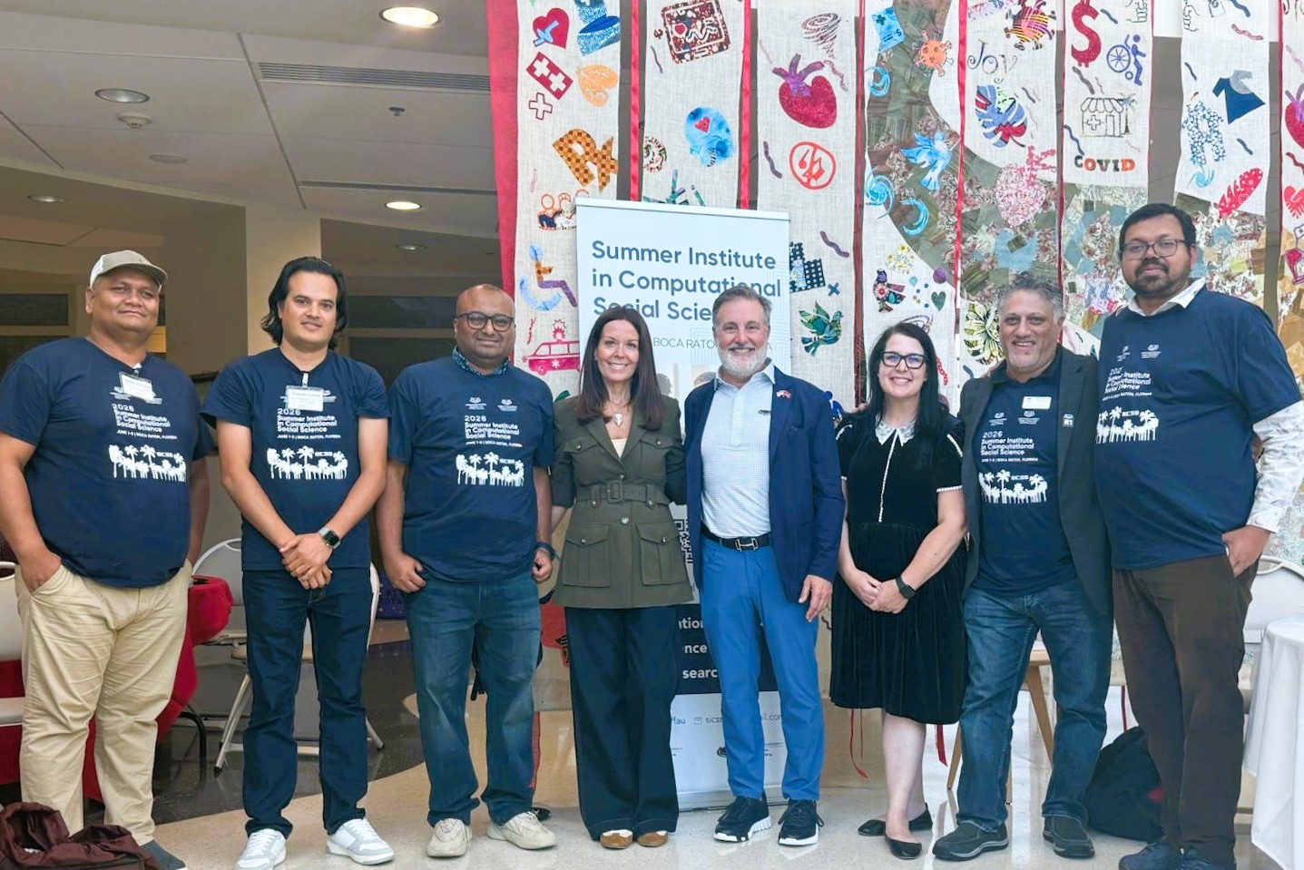 Florida Atlantic University President Adam Hasner and First Lady Jillian Hasner join conference participants (L-R) Ganesh Shiwakoti, PhD; Deepak Bastola, PhD, Debarshi Datta, PhD; Morgan Cooley, PhD, David Newman, PhD and Subhosit Ray, PhD.
